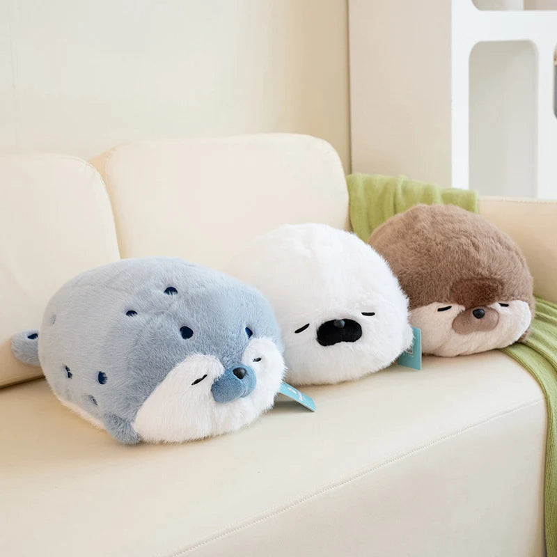 Sello de auriculares de dibujos animados de alta calidad, lontra marina, juguete de peluche, bola, cojín redondo, almohada para niños, regalo de cumpleaños, siesta escolar y sueño