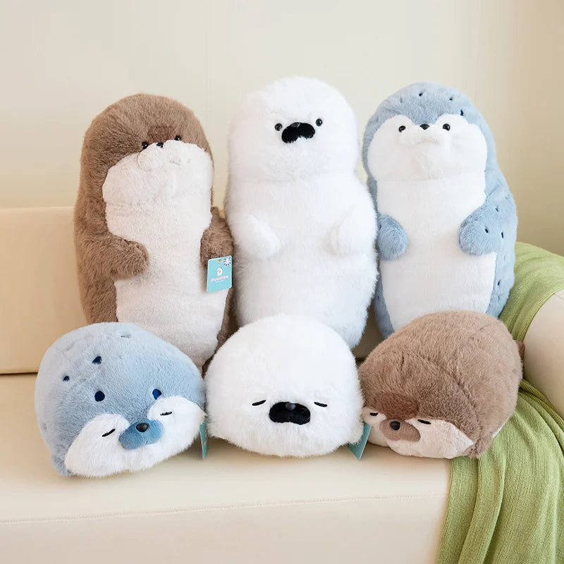 Sello de auriculares de dibujos animados de alta calidad, lontra marina, juguete de peluche, bola, cojín redondo, almohada para niños, regalo de cumpleaños, siesta escolar y sueño