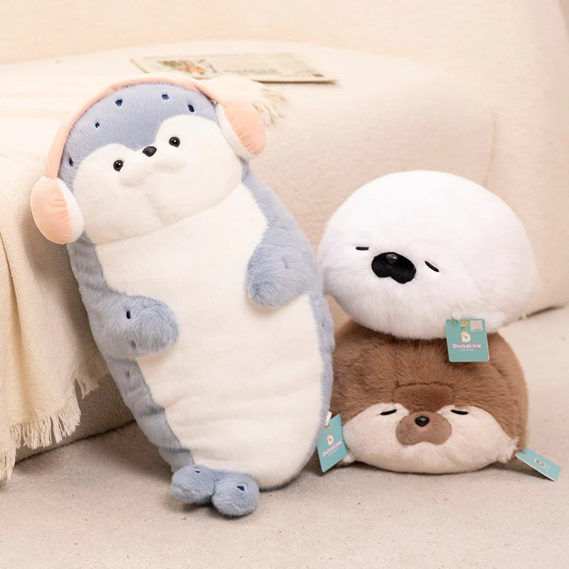 Sello de auriculares de dibujos animados de alta calidad, lontra marina, juguete de peluche, bola, cojín redondo, almohada para niños, regalo de cumpleaños, siesta escolar y sueño