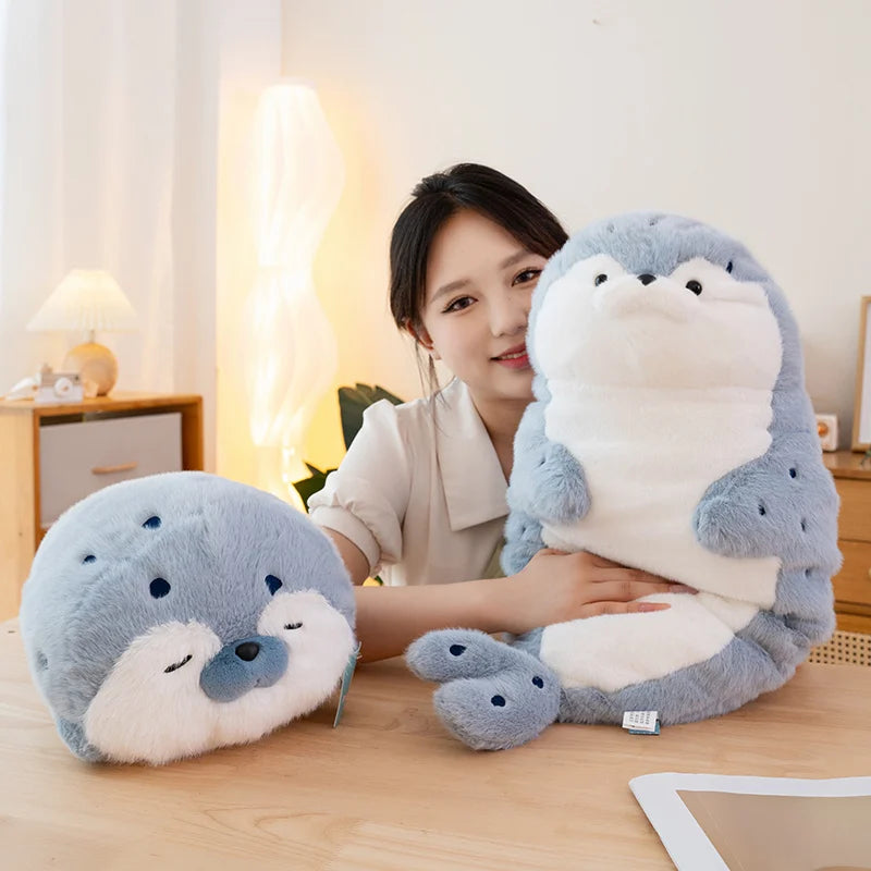 Sello de auriculares de dibujos animados de alta calidad, lontra marina, juguete de peluche, bola, cojín redondo, almohada para niños, regalo de cumpleaños, siesta escolar y sueño