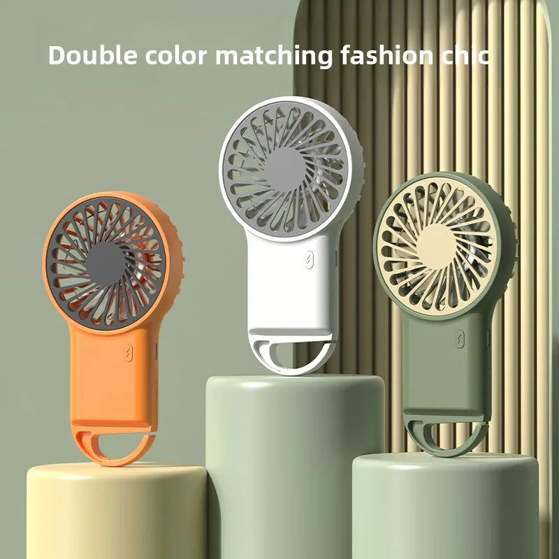 Miniventilador plegable de mano recargable por USB, diseño de dibujos animados con gancho para montañismo, uso en el hogar y la Oficina al aire libre, nuevo